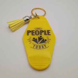 Motel hotel retro styled yellow introvert keychain with tassel